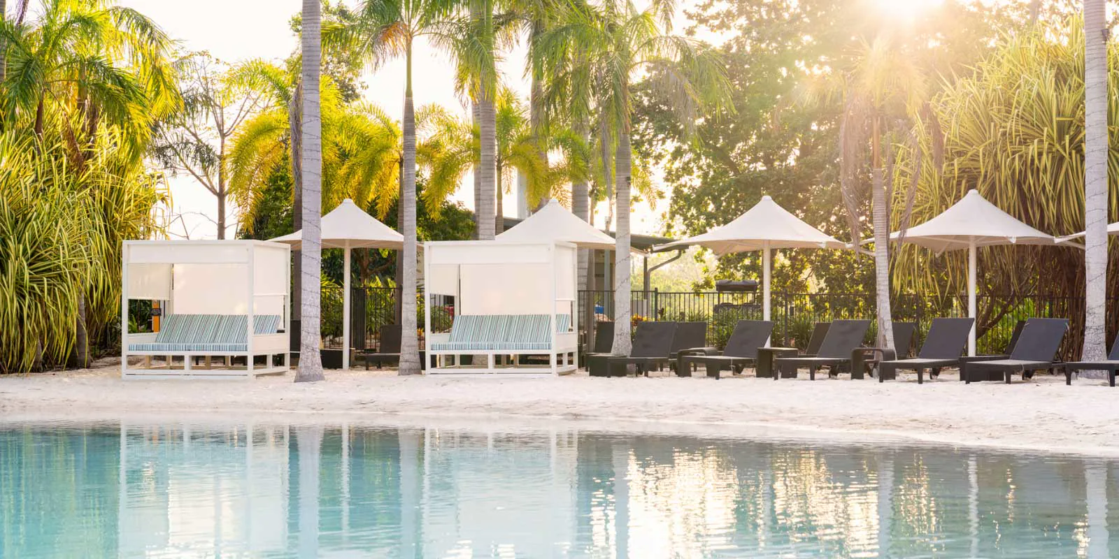 Tropical pool and cabanas at Mindil Beach Casino Resort in Darwin